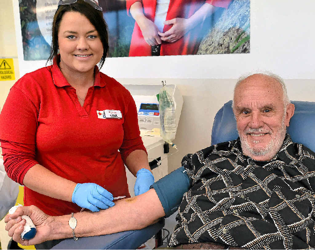 OLD HAND: Nurse Louise Taylor prepares James Harrison for his 1075th blood donation. OLD HAND: Nurse Louise Taylor prepares James Harrison for his 1075th blood donation.